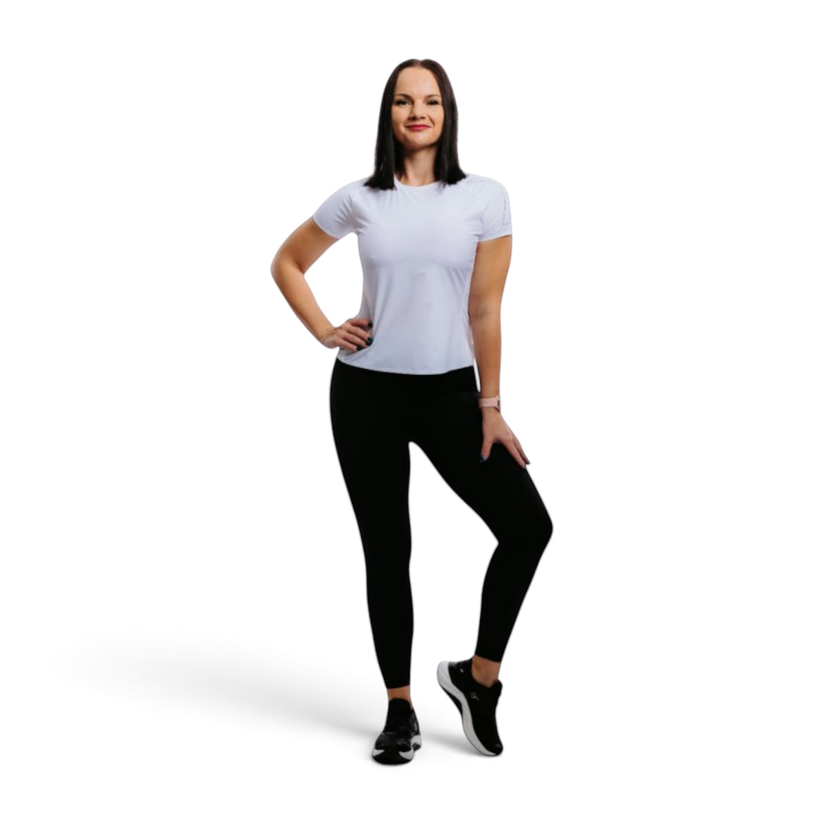 FRG model wearing ANTA black yoga crop tights and a white t-shirt for athletic training