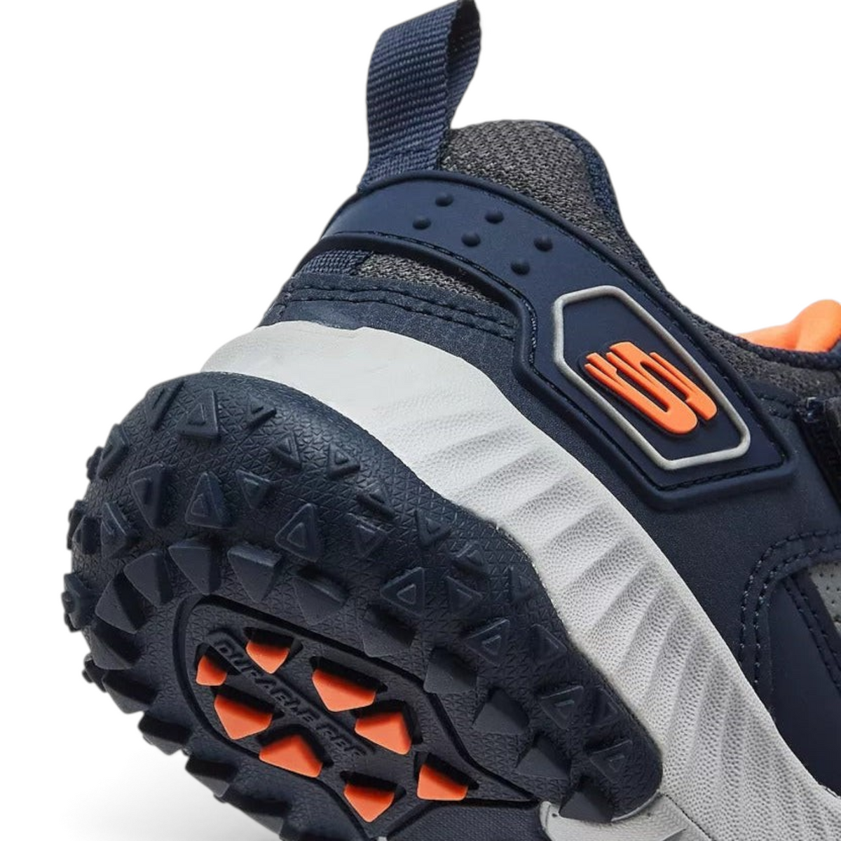 FRG SKECHERS ELITE SPORT FIELD sneaker heel detail showing navy mesh, textured rubber outsole, and orange accents.